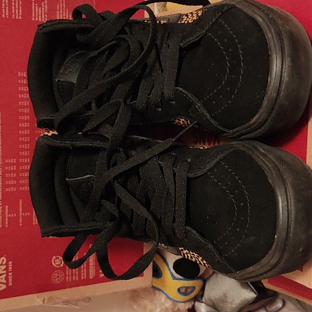 Black cheetah Vans